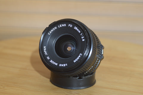 Vintage Canon FD 28mm f2.8 lens. This is a fantastic wide angle lens in great condition.