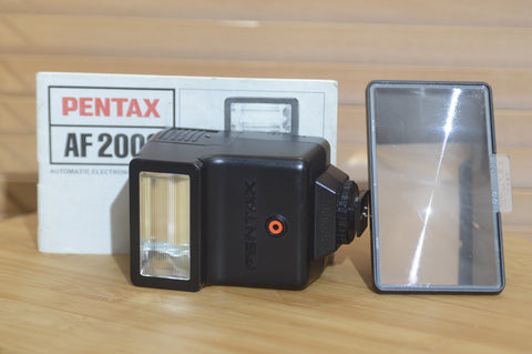 Asahi Pentax AF 200s Flash with Instruction Manual and Filter Hood.