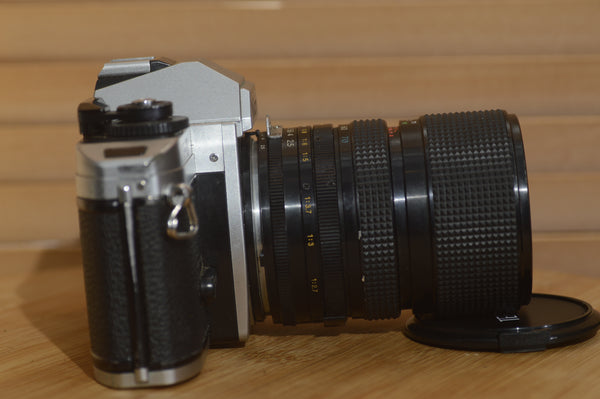 Vintage Nikon FG20 35mm SLR with Tefnon 35-70mm f2.5-3.5 Lens. - Rewind Cameras 