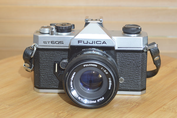 Fujica ST605 35mm SLR camera with 55mm f2.2 lens and case, vintage Rewind Cameras model in excellent condition.