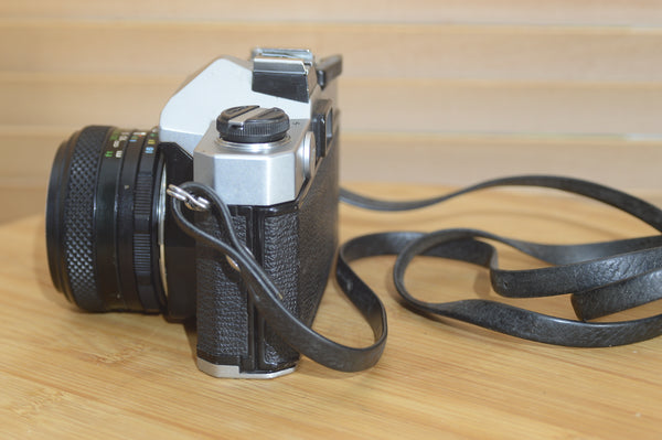 Fujica ST605 35mm SLR camera with 55mm f2.2 lens and case, vintage solid metal camera by Rewind Cameras