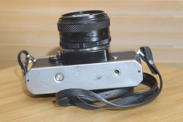 Fujica ST605 35mm SLR camera with 55mm f2.2 lens and case, vintage solid camera from Rewind Cameras.