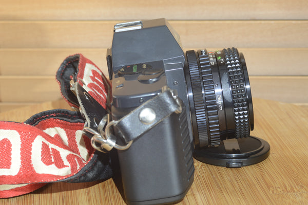 Fantastic Canon T50 camera with 28mm f2.8 lens. In superb condition.
