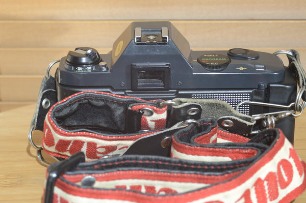 Fantastic Canon T50 camera with 28mm f2.8 lens. In superb condition.