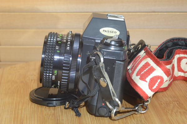 Fantastic Canon T50 camera with 28mm f2.8 lens. In superb condition.