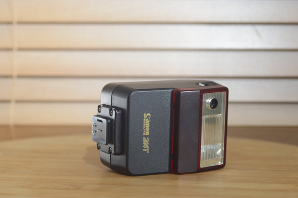 Canon Speedlite 244t flash unit with case, vintage camera accessory, shown in original box for professional photography lighting.