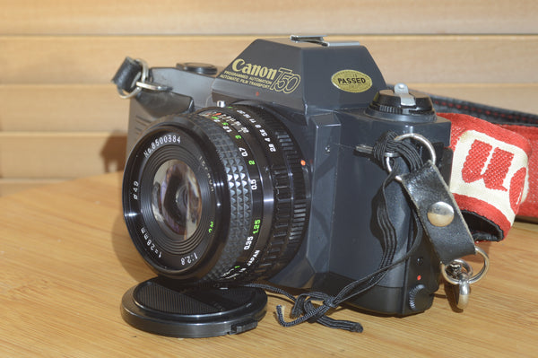 Fantastic Canon T50 camera with 28mm f2.8 lens. In superb condition.
