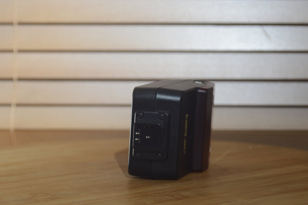 Canon Speedlite 244t flash unit with case in original box, vintage photography accessory from Rewind Cameras.