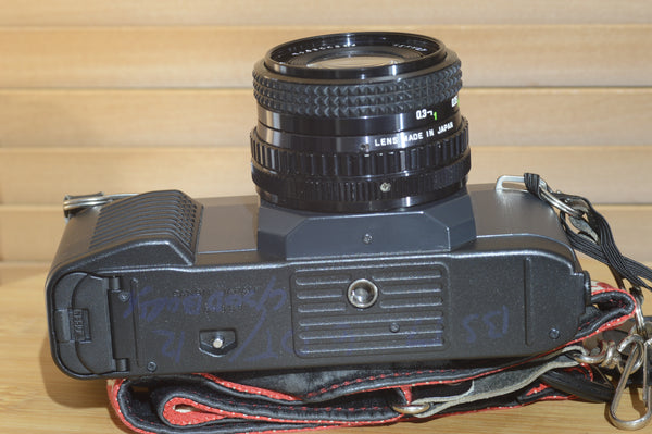 Fantastic Canon T50 camera with 28mm f2.8 lens. In superb condition.