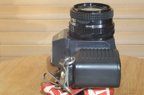 Fantastic Canon T50 camera with 28mm f2.8 lens. In superb condition.
