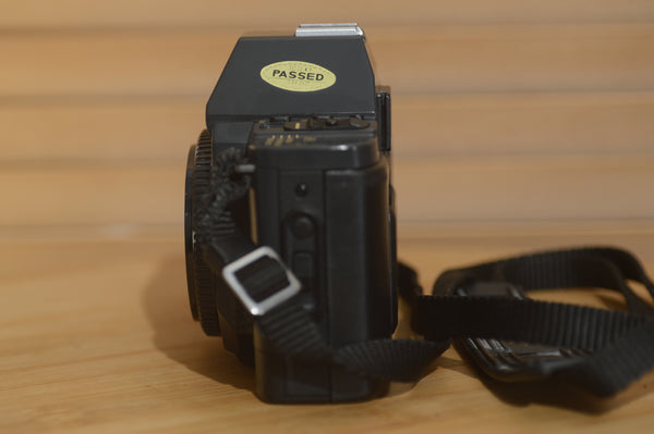 Vintage Canon T70 35mm SLR Camera. Fantastic starter camera, taking Canon FD lenses - Rewind Cameras 