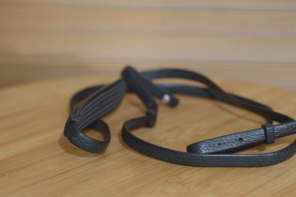 Black leather Olympus strap. Lovely addition to your Olympus set up.