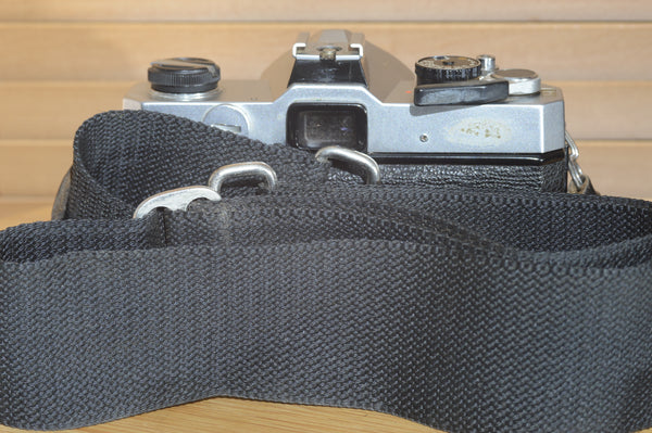 Fujica ST605n SLR with 28mm f3.5 lens and case.  A striking vintage camera.