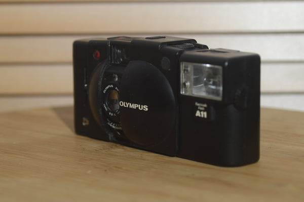 Stunning Olympus XA3 with A1L flash. A beautiful compact camera. Great for smaller hands! - RewindCameras quality vintage cameras, fully tested and serviced