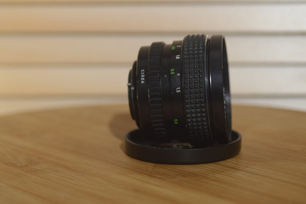 Hanimex Automatic 28mm f2.8 M42 Wide Angle Lens. - Rewind Cameras 