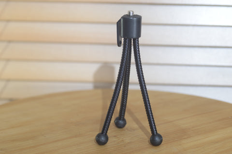 Adorable Pocket Size Tripod. Excellent way to keep the camera steady when on the go