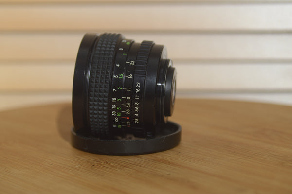 Hanimex Automatic 28mm f2.8 M42 Wide Angle Lens. - Rewind Cameras 