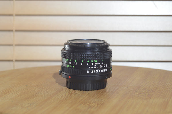 Canon FDn 50mm f1.8 prime lens in fantastic condition, Olympic Games edition, 35mm camera lens by Rewind Cameras