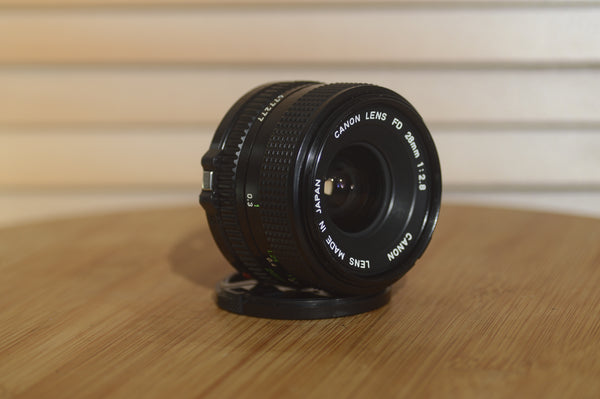 Canon FD 28mm f2.8 lens. This is a fantastic wide angle lens in superb condition. - Rewind Cameras 