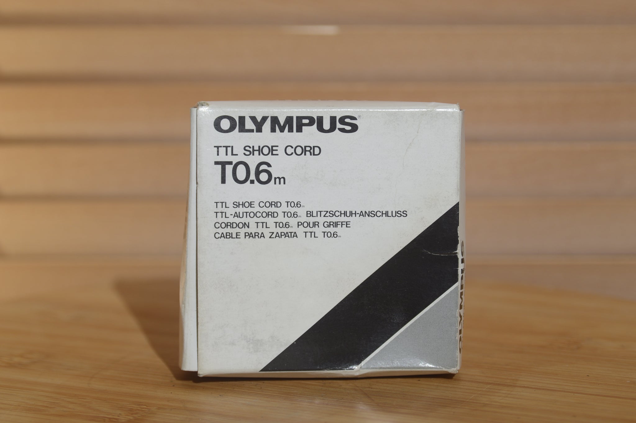 Boxed Olympus TTL Shoe Cord T0.6m. Comes with Instruction manual. - Rewind Cameras 