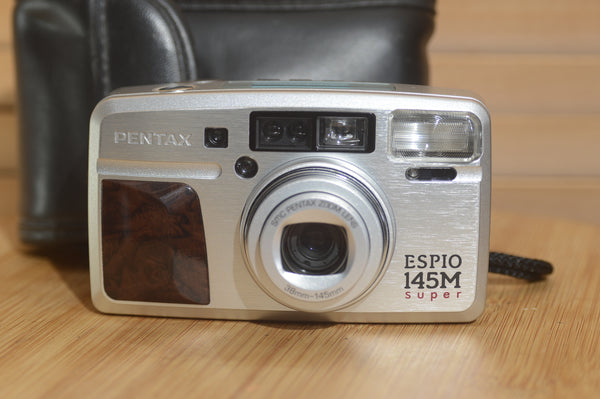 Pentax Espio 738 Compact Camera with strap and case. Perfect, lightweight 35mm to put in a pocket, bag or belt loop. - Rewind Cameras 