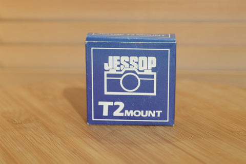 Boxed Jessops Olympus OM to T2 Adapter. A great way to explore the T2 lenses out there. - Rewind Cameras 