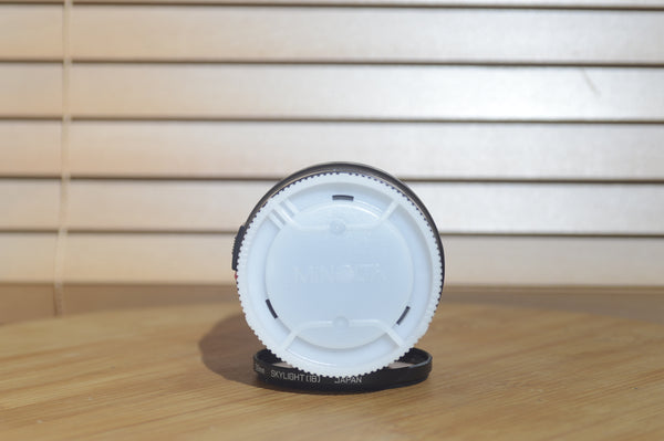 Minolta AF 28-80mm f/3.5-5.6 camera lens with autofocus, boxed, compatible with Minolta 35mm and digital cameras.