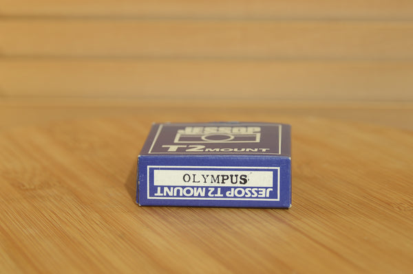 Boxed Jessops Olympus OM to T2 Adapter. A great way to explore the T2 lenses out there. - Rewind Cameras 