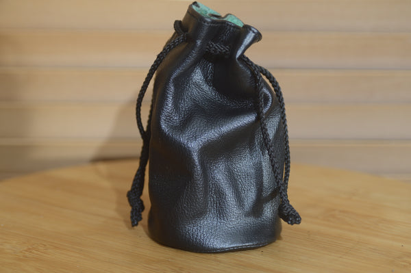 Vintage Black and Greed Soft Leatherette Drawstring Lens Pouch. Ideal for protecting your lens in your bag.