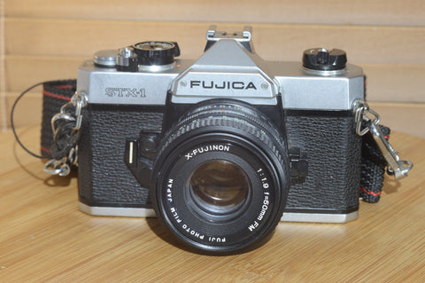 Fujica STX-1 SLR with 50mm f1.9 Lens. These are very solid and striking vintage cameras.