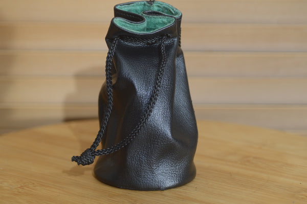 Vintage Black and Greed Soft Leatherette Drawstring Lens Pouch. Ideal for protecting your lens in your bag.