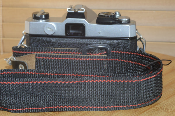 Fujica STX-1 SLR with 50mm f1.9 Lens. These are very solid and striking vintage cameras.