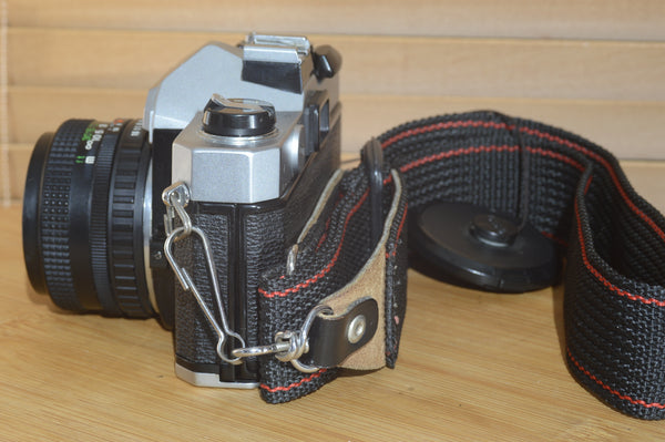 Fujica STX-1 SLR with 50mm f1.9 Lens. These are very solid and striking vintage cameras.