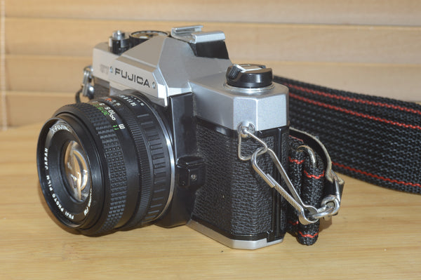 Fujica STX-1 SLR with 50mm f1.9 Lens. These are very solid and striking vintage cameras.