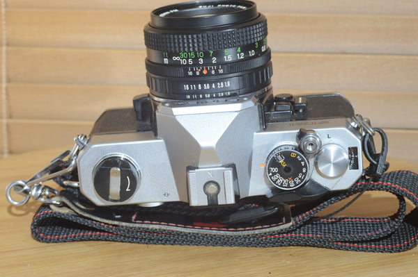 Fujica STX-1 SLR with 50mm f1.9 Lens. These are very solid and striking vintage cameras.