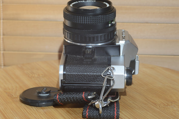 Fujica STX-1 SLR with 50mm f1.9 Lens. These are very solid and striking vintage cameras.