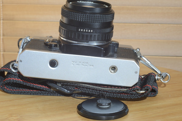 Fujica STX-1 SLR with 50mm f1.9 Lens. These are very solid and striking vintage cameras.