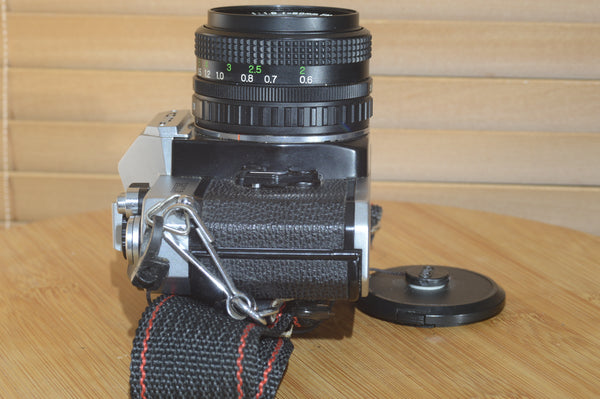 Fujica STX-1 SLR with 50mm f1.9 Lens. These are very solid and striking vintage cameras.