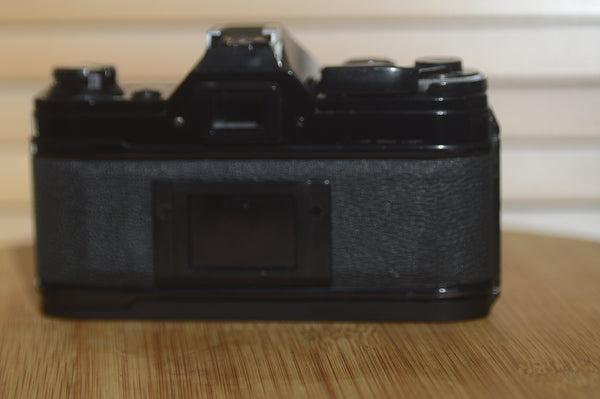 Rare Black Canon AE1 35mm SLR Camera, body only. Excellent Starter Camera. - Rewind Cameras 