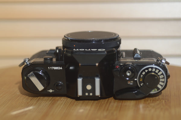 Rare Black Canon AE1 35mm SLR Camera, body only. Excellent Starter Camera. - Rewind Cameras 