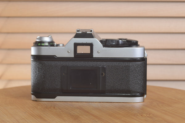 Canon AE1 P 35mm SLR camera body by Rewind Cameras, shown with its classic design and controls on the camera body.