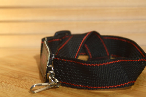 Black and Red Olympus strap. Lovely addition to your Olympus set up.