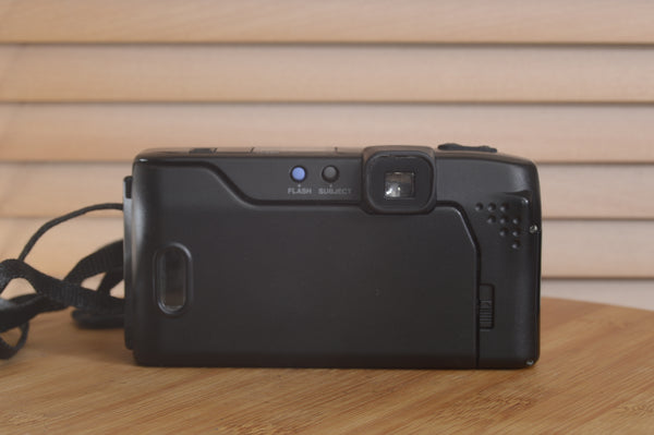 Pentax AZ200 35mm film camera in boxed condition, by Rewind Cameras, showing the camera body and packaging.