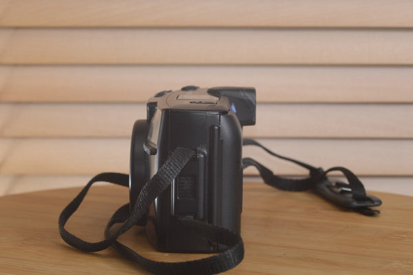 Pentax AZ200 35mm film camera in box, Rewind Cameras brand, in excellent condition with lens and accessories visible.