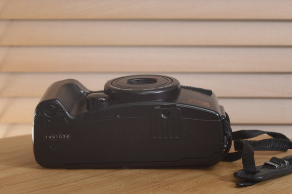 Pentax AZ200 35mm film camera in boxed condition, vintage Rewind Cameras model with lens and accessories visible.