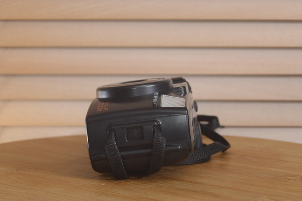 Pentax AZ200 35mm film camera in excellent boxed condition, with lens and viewfinder visible in the image.