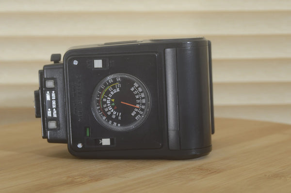 Canon 199a flash unit compatible with A series Canon cameras, clean and tested for 35mm photography.