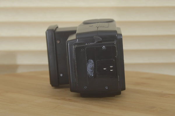 Canon 199A flash unit compatible with Canon A series cameras, clean and tested for 35mm photography.