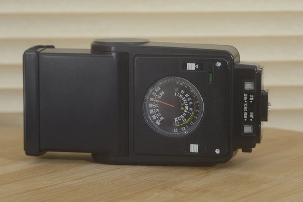 Canon 199A flash unit for Canon A series cameras, 35mm film compatible, clean and tested for reliable photography.