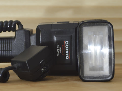 Cobra 650 lcd system Flash gun Canon dedicated.  This is a fantastic flash and super easy to use with the LCD readout. - RewindCameras quality vintage cameras, fully tested and serviced